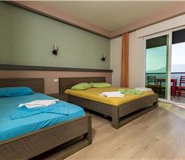 Triple room with Balcony and Panoramic sea view + extra bed upon request