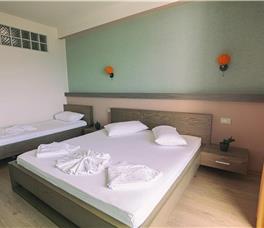 Triple room with Balcony and Panoramic sea view + extra bed upon request