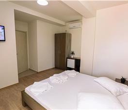 Apartment Two-Bedroom with Balcony and Sea view + extra bed upon request