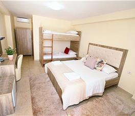 Four-bedded Room with double bed + 2 single beds or double bed + bunk bed