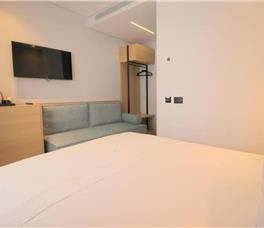 Double room Back view without balcony (Double bed + Sofa)