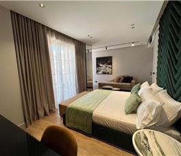 Dhome Treshe Deluxe me ballkon dhe pamje nga deti