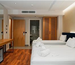 Family room with Double bed, Single bed and Sofa