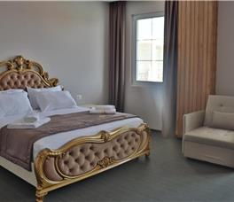 Room Deluxe Triple (Double bed + folding armchair)