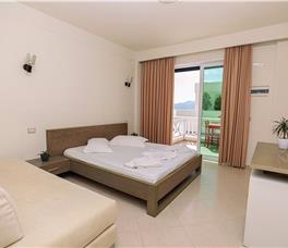 Double room with Patio, Double bed + extra bed upon request